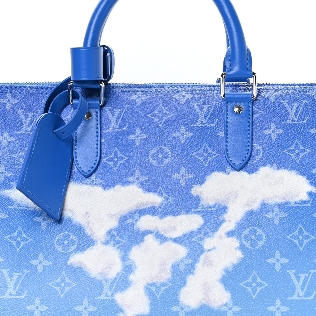 MONOGRAM CLOUDS KEEPALL BANDOULIERE 50 BLUE