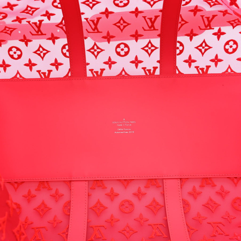 MONOGRAM FLUO SEE THROUGH KEEPALL BANDOULIERE 50 ROSE
