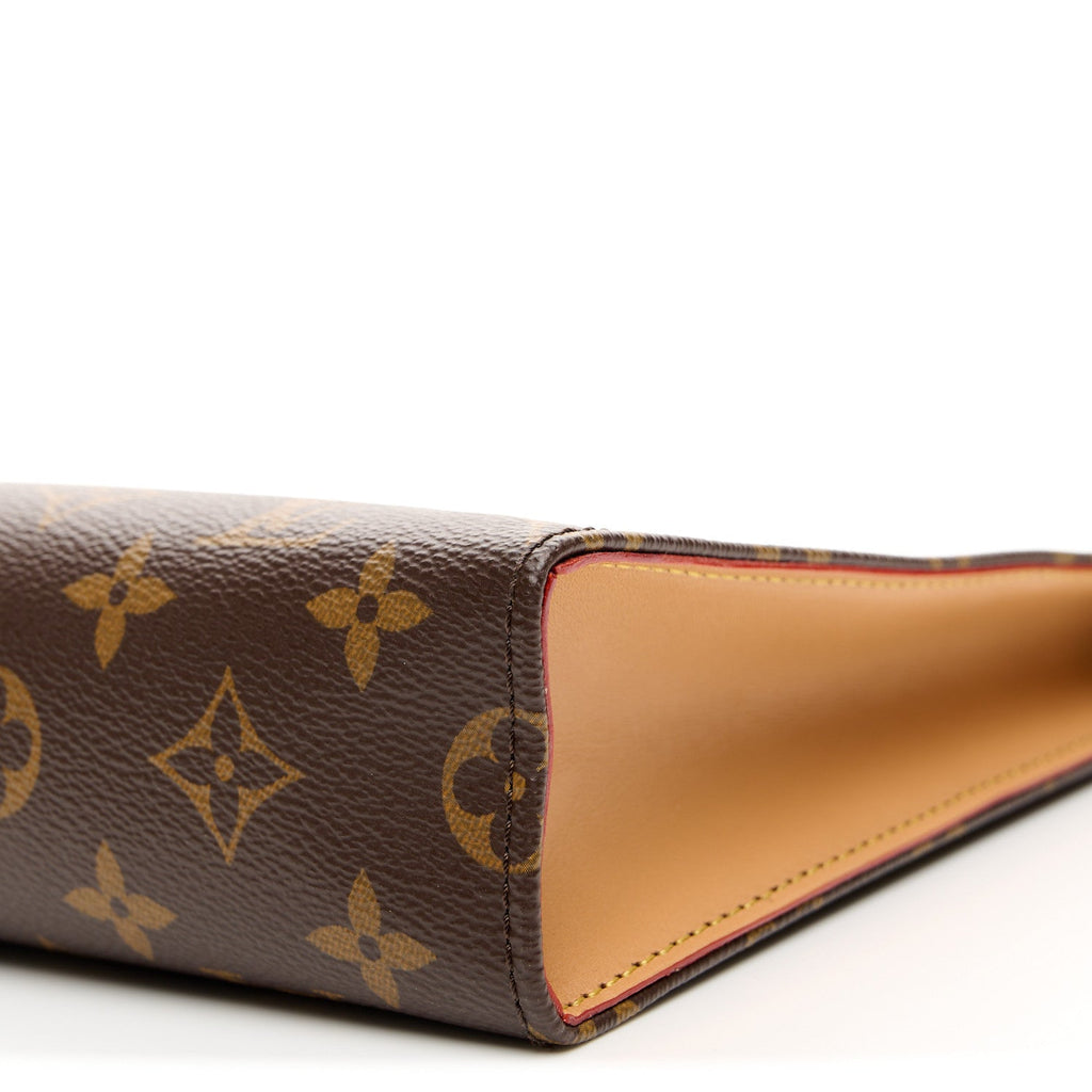 MONOGRAM TOILETRY POUCH ON CHAIN