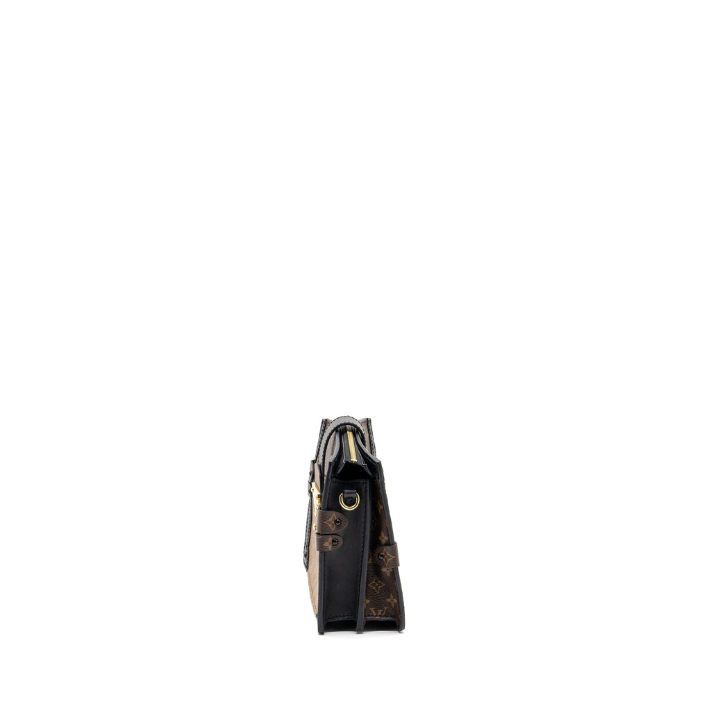 TRUNK CLUTCH MONOGRAM REVERSE CANVAS GHW