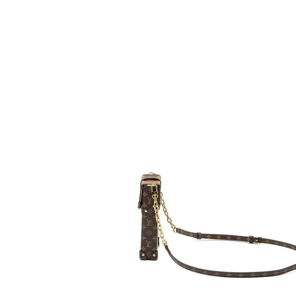 VERTICAL TRUNK POCHETTE WITH CHAIN MONOGRAM REVERSE CANVAS GHW