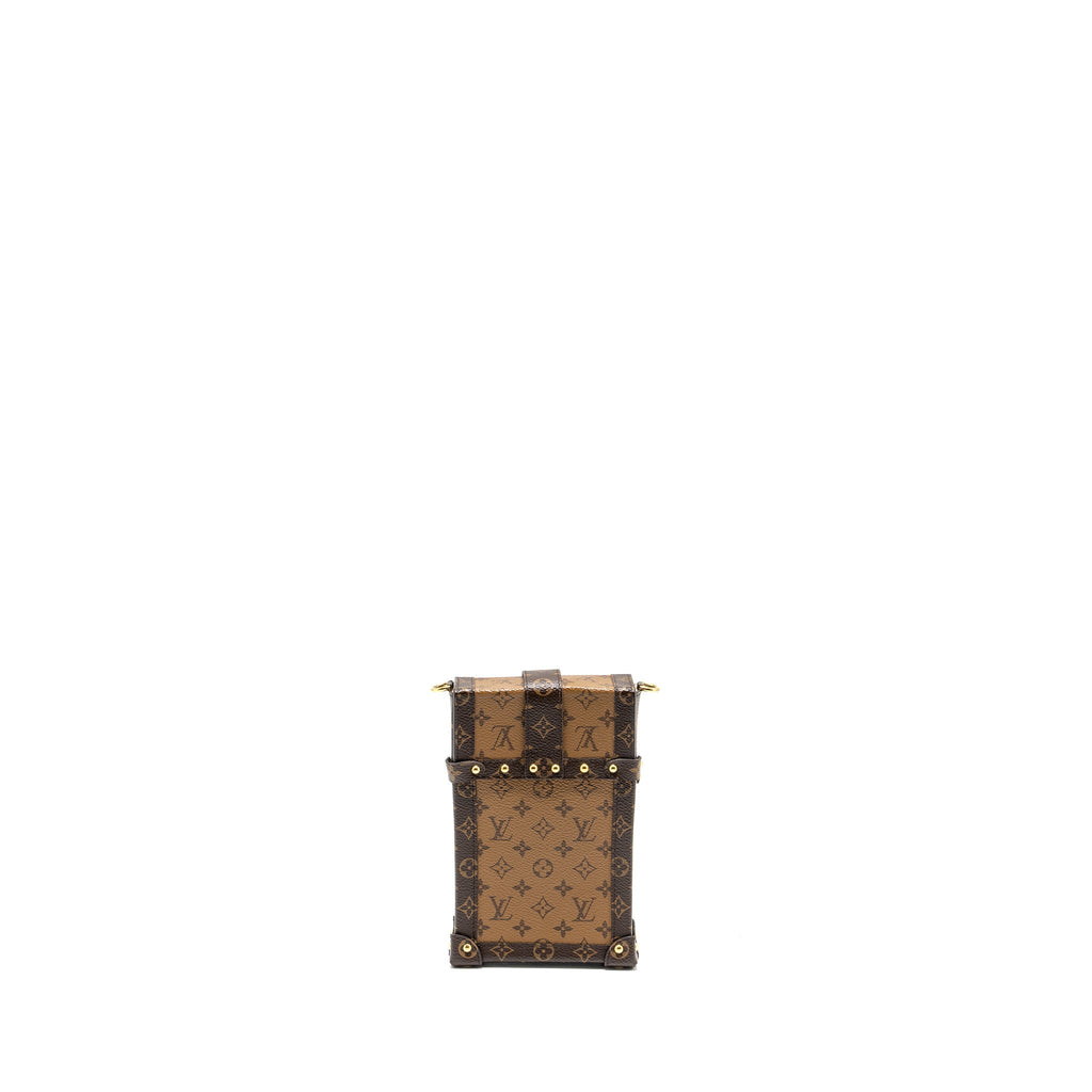 VERTICAL TRUNK POCHETTE WITH CHAIN MONOGRAM REVERSE CANVAS GHW