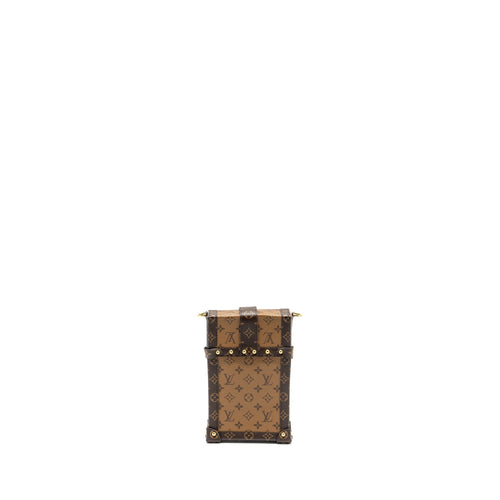 VERTICAL TRUNK POCHETTE WITH CHAIN MONOGRAM REVERSE CANVAS GHW