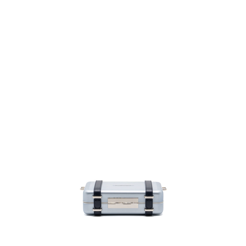 X RIMOWA CLUTCH TRUNK BAG ALUMINIUM / CALFSKIN SILVER / BLACK SHW