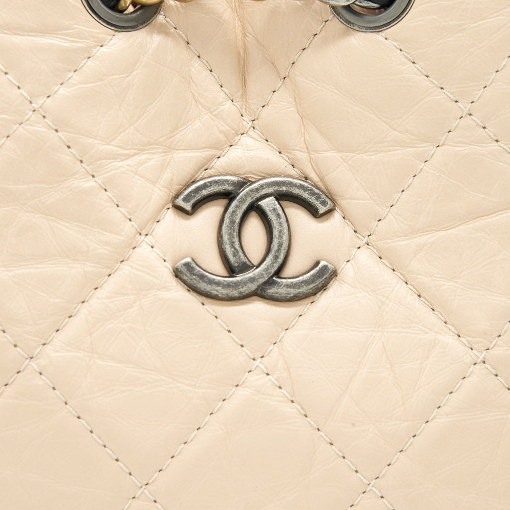 GABRIELLE BACKPACK IN AGED CALFSKIN QUILTED LEATHER BEIGE