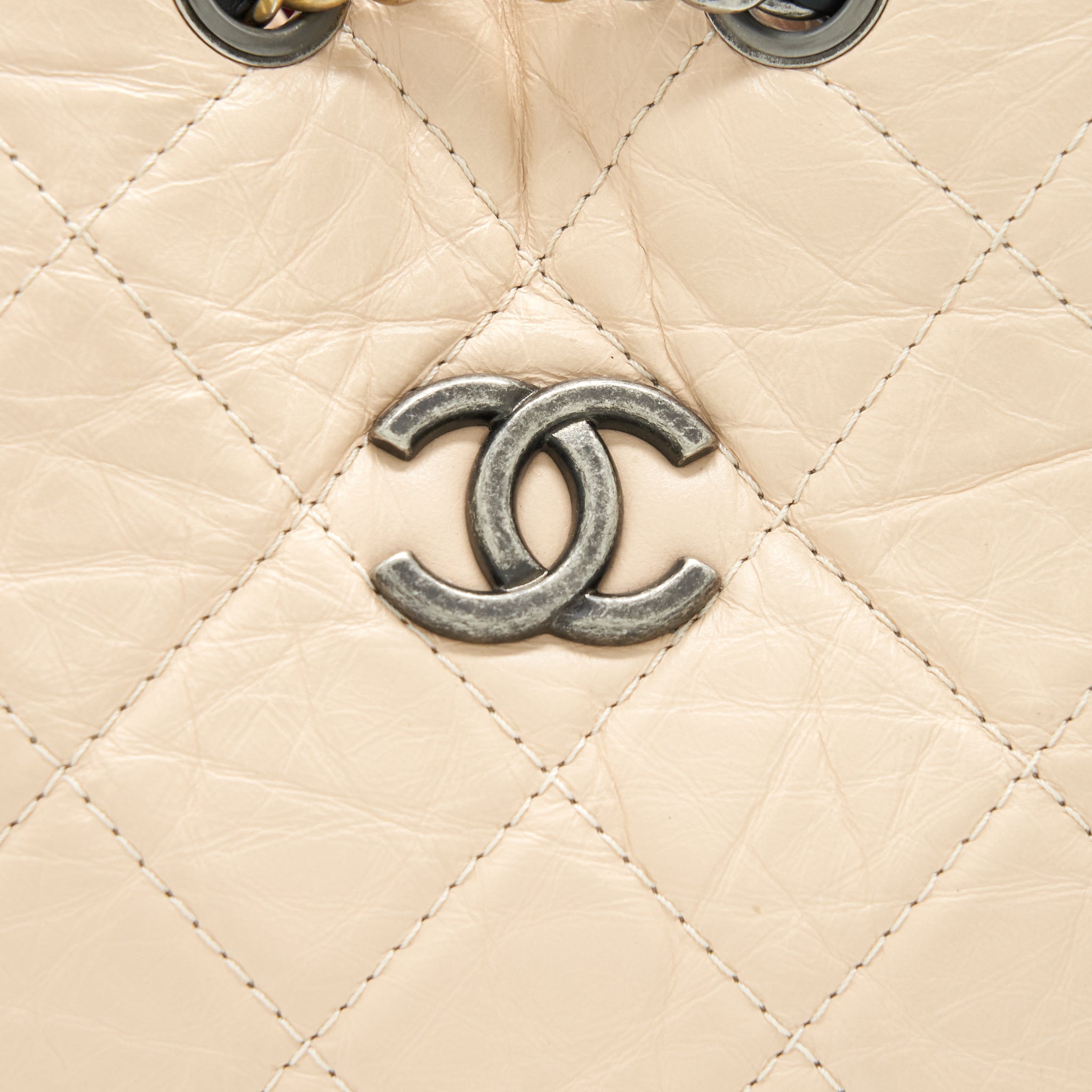 GABRIELLE BACKPACK IN AGED CALFSKIN QUILTED LEATHER BEIGE