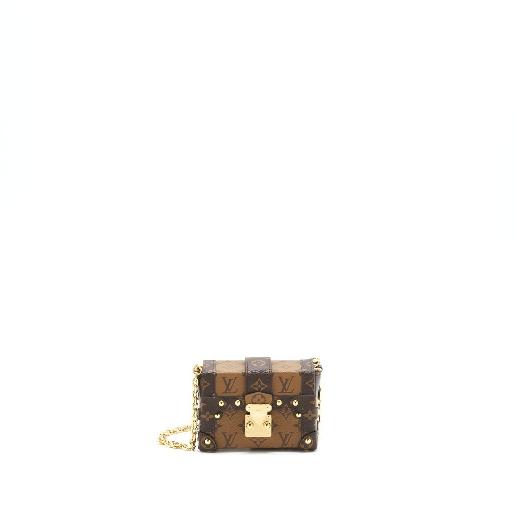ESSENTIAL TRUNK WITH CHAIN REVERSE MONOGRAM