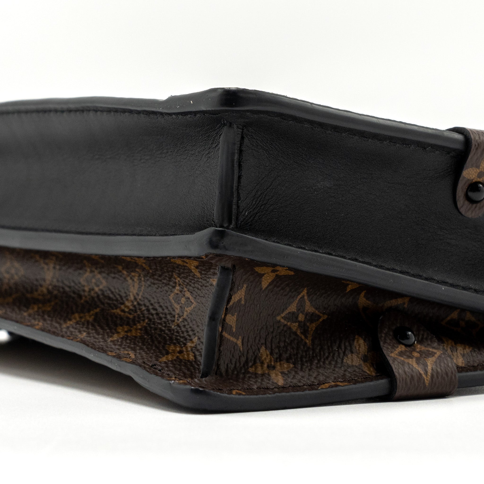 TRUNK CLUTCH MONOGRAM REVERSE CANVAS GHW