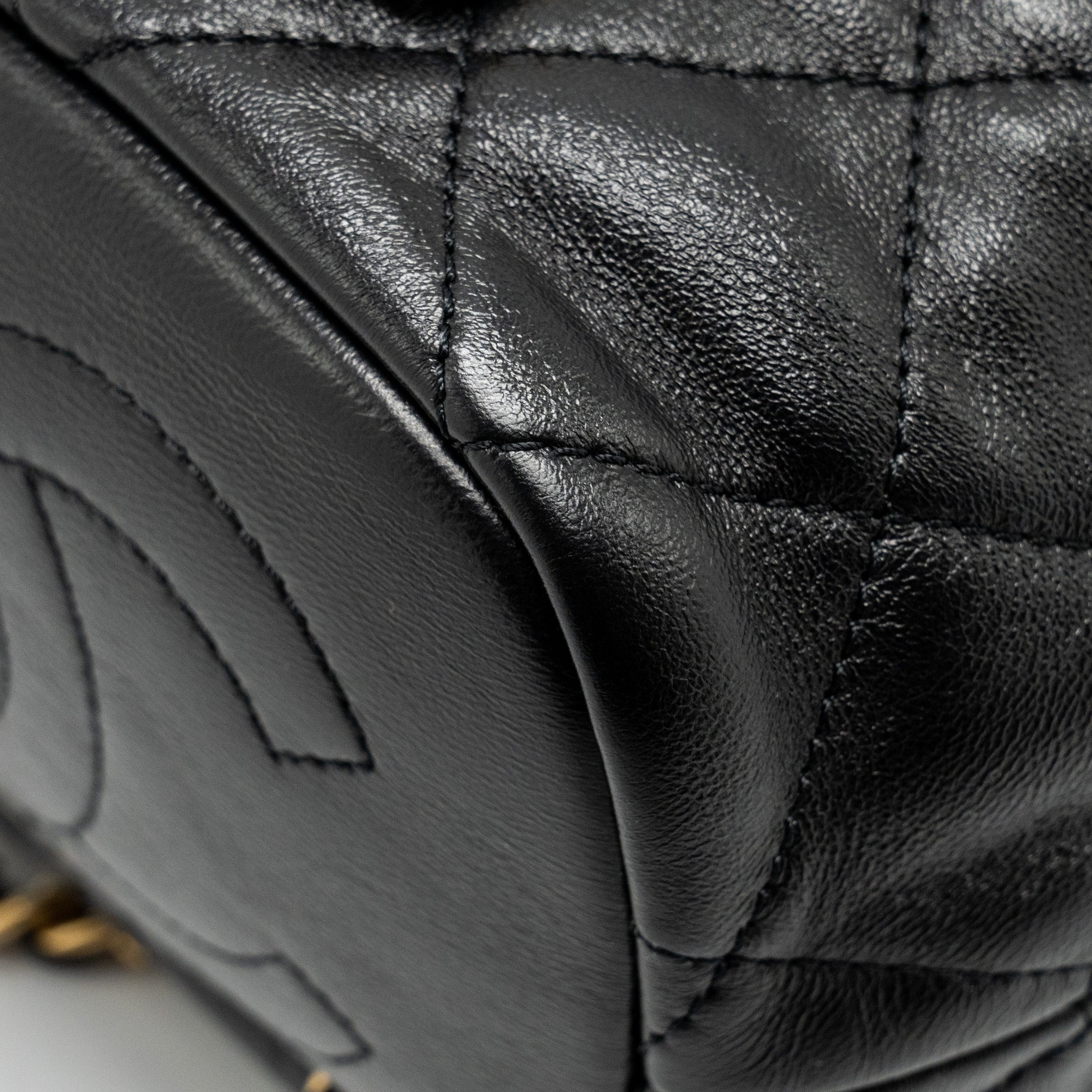 22S CANDY CHAINS MINI BUCKET BACKPACK LAMBSKIN BLACK GHW (MICROCHIP)