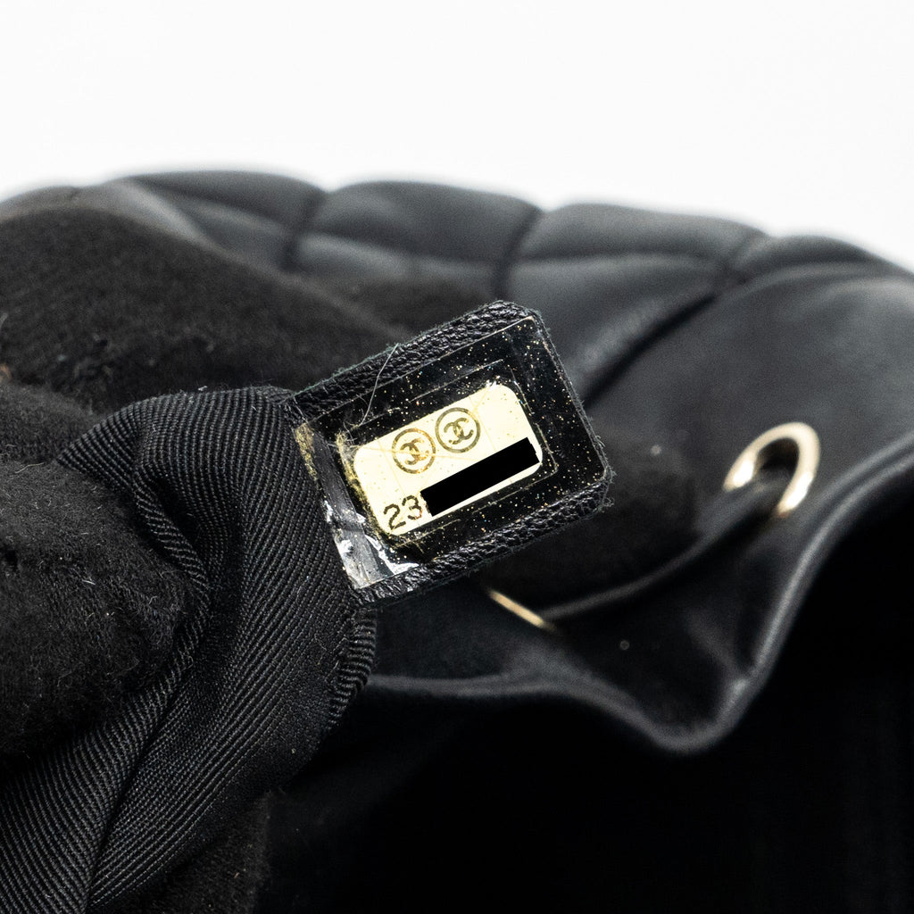 QUILTED FLAP BACKPACK LAMBSKIN BLACK GHW