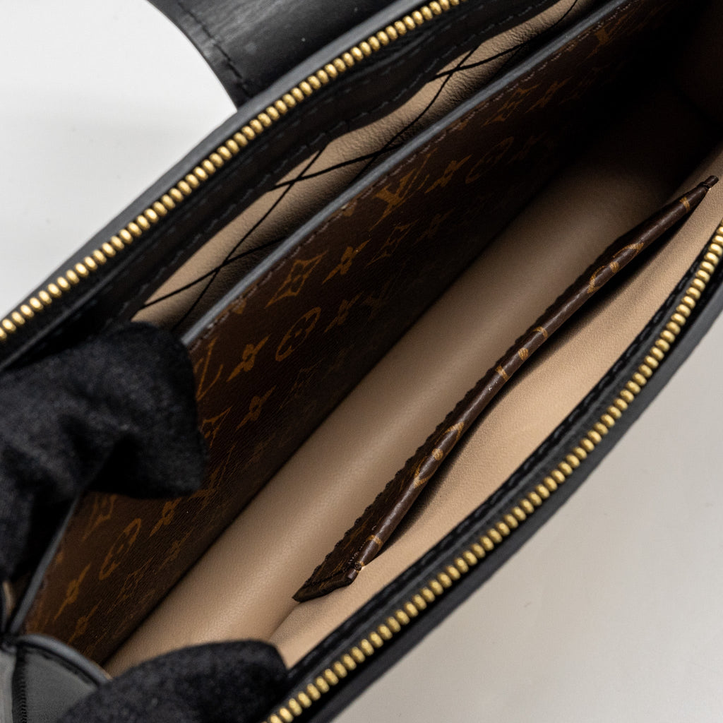 TRUNK CLUTCH MONOGRAM REVERSE CANVAS GHW