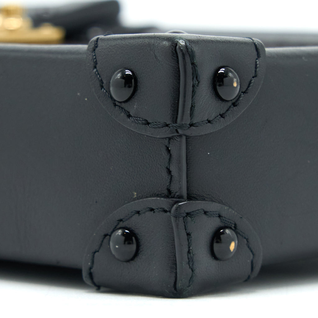 VERTICAL TRUNK POCHETTE WITH CHAIN MONOGRAM CANVAS GHW