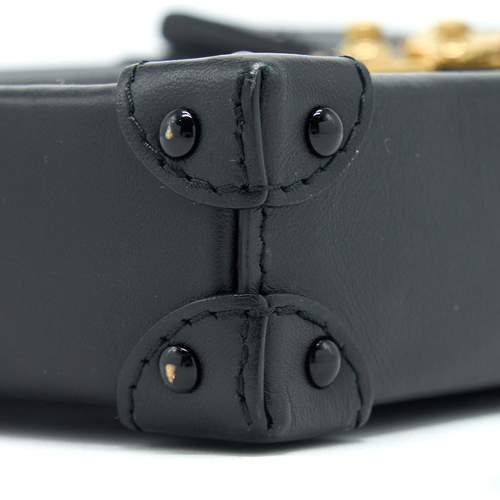 VERTICAL TRUNK POCHETTE WITH CHAIN MONOGRAM CANVAS GHW