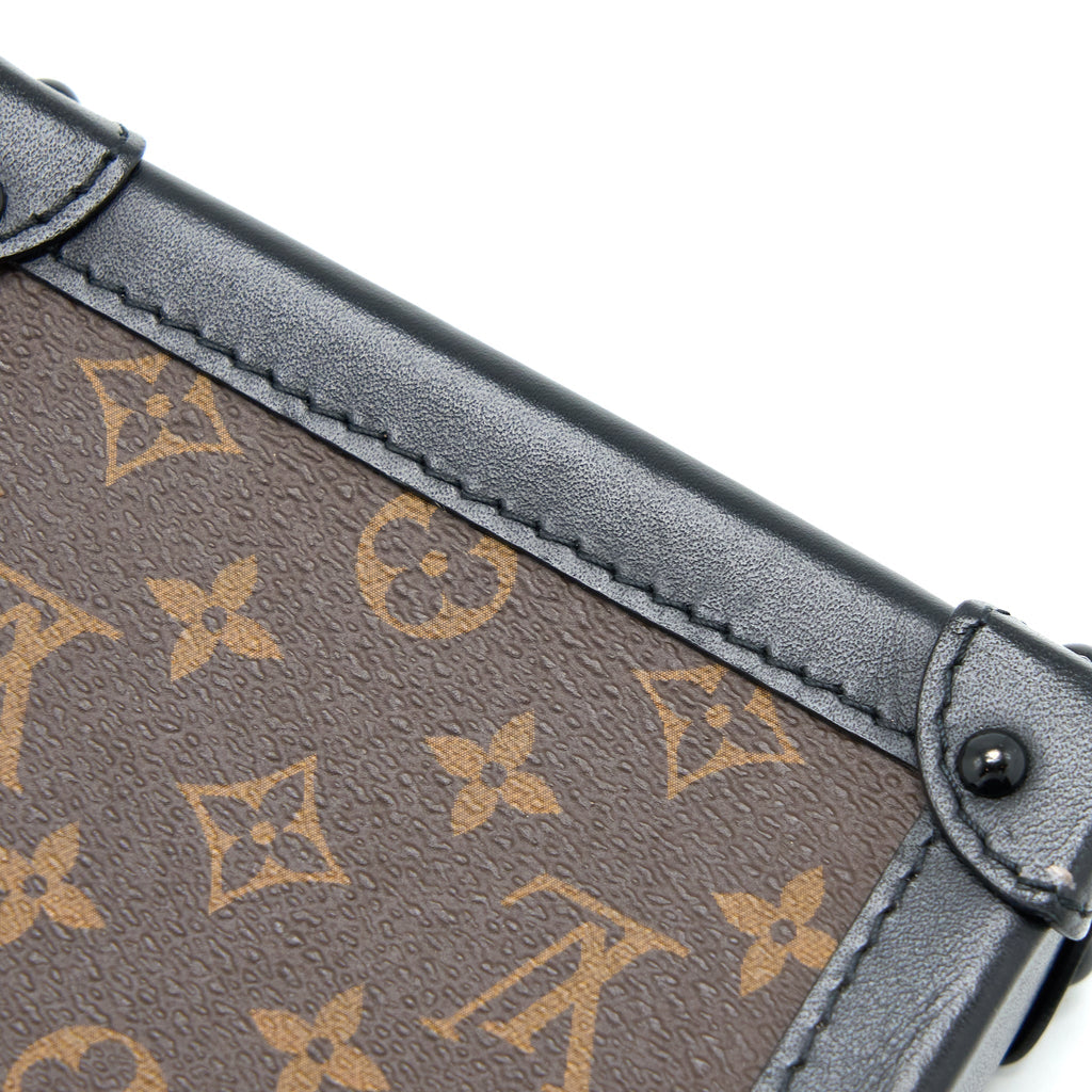 VERTICAL TRUNK POCHETTE WITH CHAIN MONOGRAM CANVAS GHW