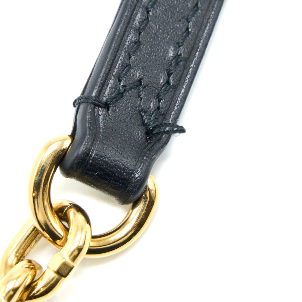 VERTICAL TRUNK POCHETTE WITH CHAIN MONOGRAM CANVAS GHW