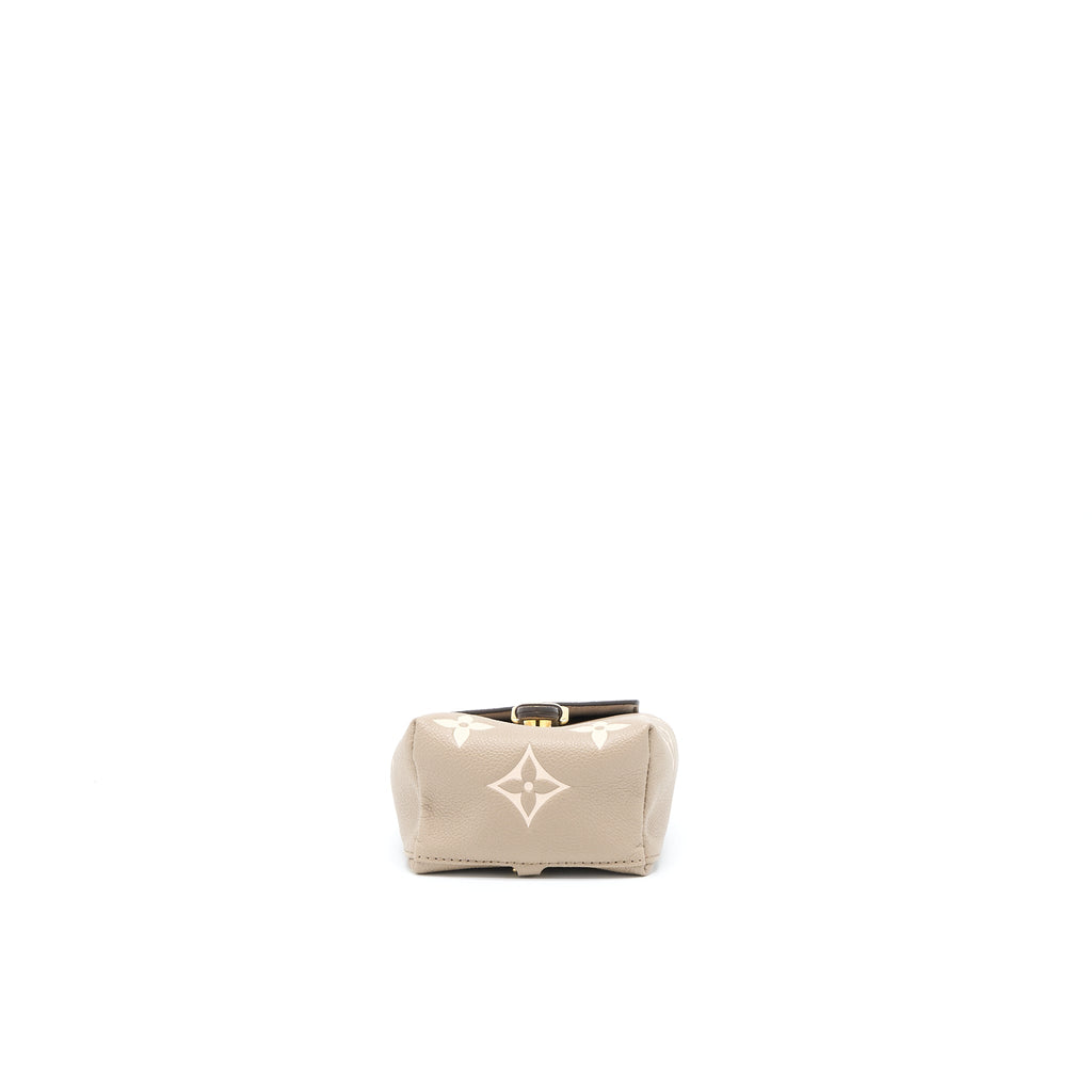 TINY BACKPACK MONOGRAM EMPREINTE TOURTERELLE BEIGE/ CREAM GHW