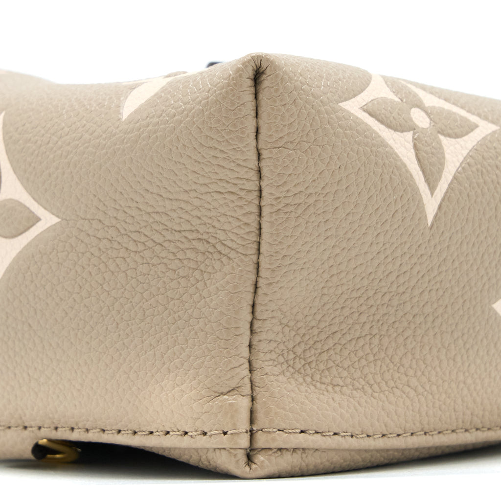TINY BACKPACK MONOGRAM EMPREINTE TOURTERELLE BEIGE/ CREAM GHW