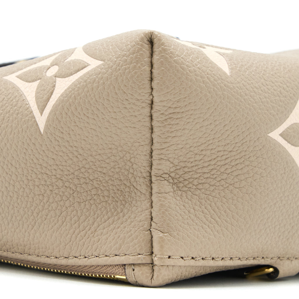 TINY BACKPACK MONOGRAM EMPREINTE TOURTERELLE BEIGE/ CREAM GHW