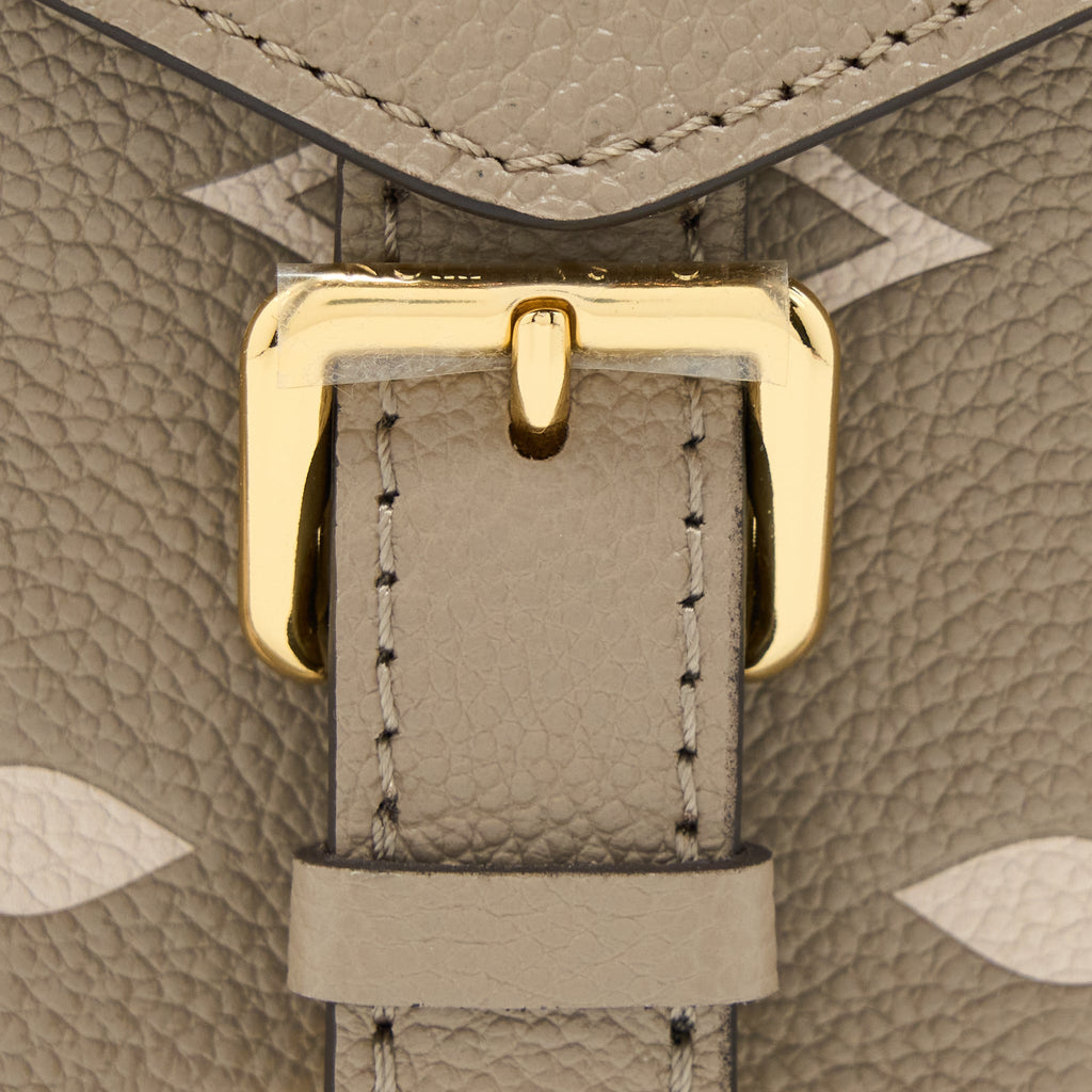 TINY BACKPACK MONOGRAM EMPREINTE TOURTERELLE BEIGE/ CREAM GHW