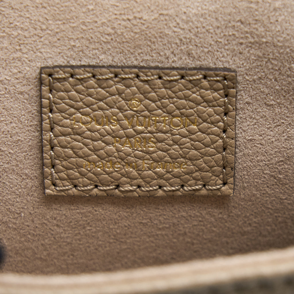 TINY BACKPACK MONOGRAM EMPREINTE TOURTERELLE BEIGE/ CREAM GHW