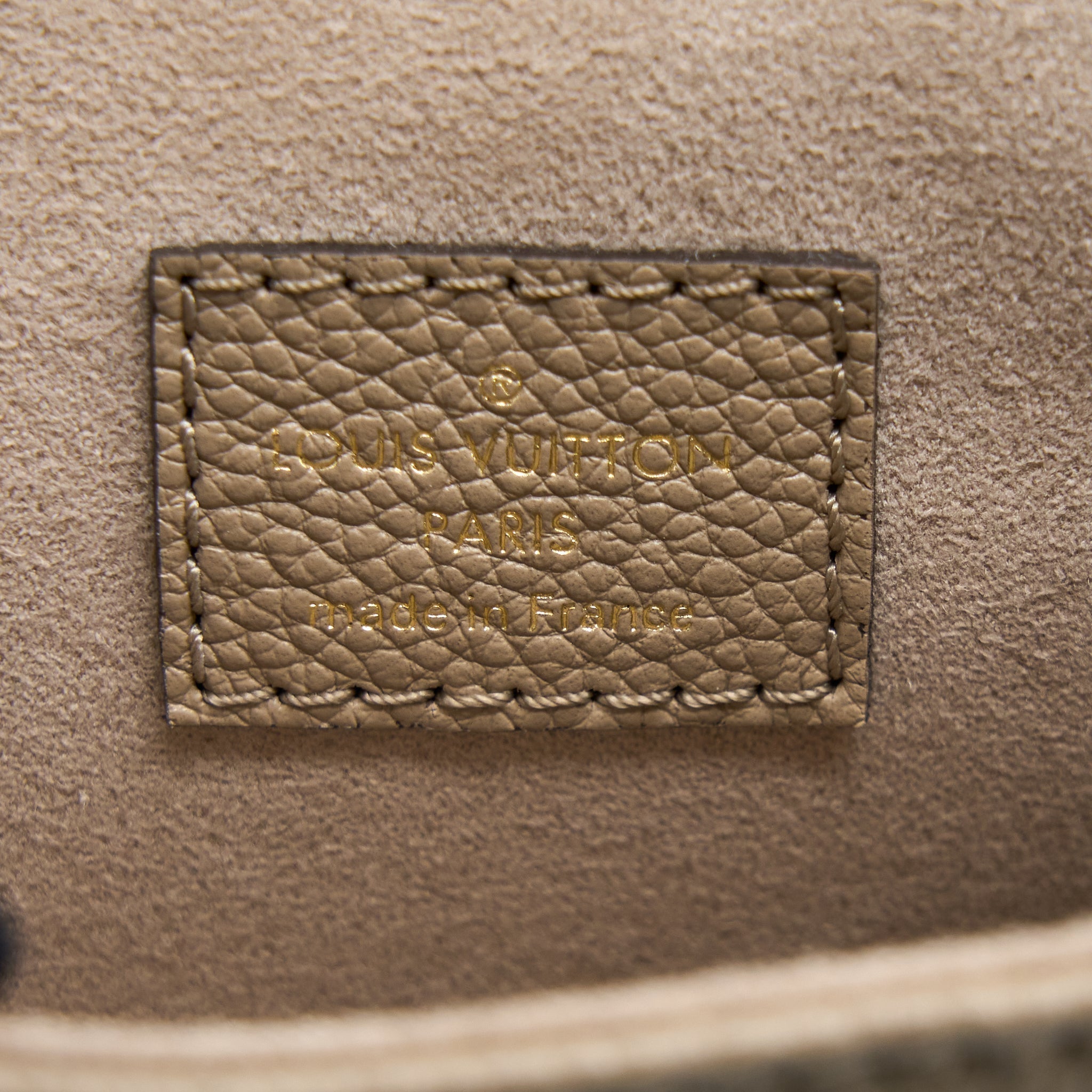 TINY BACKPACK MONOGRAM EMPREINTE TOURTERELLE BEIGE/ CREAM GHW