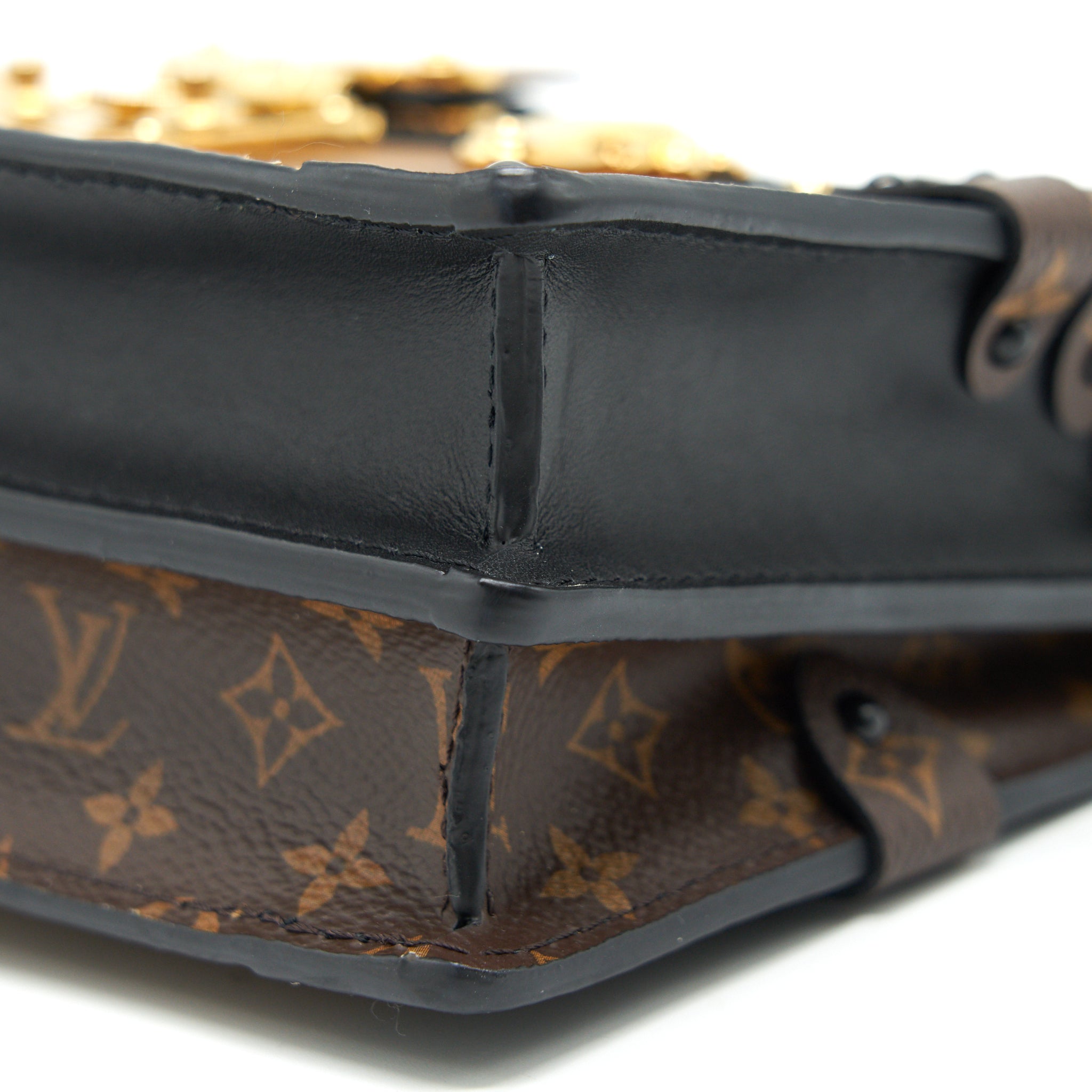 TRUNK CLUTCH MONOGRAM CANVAS