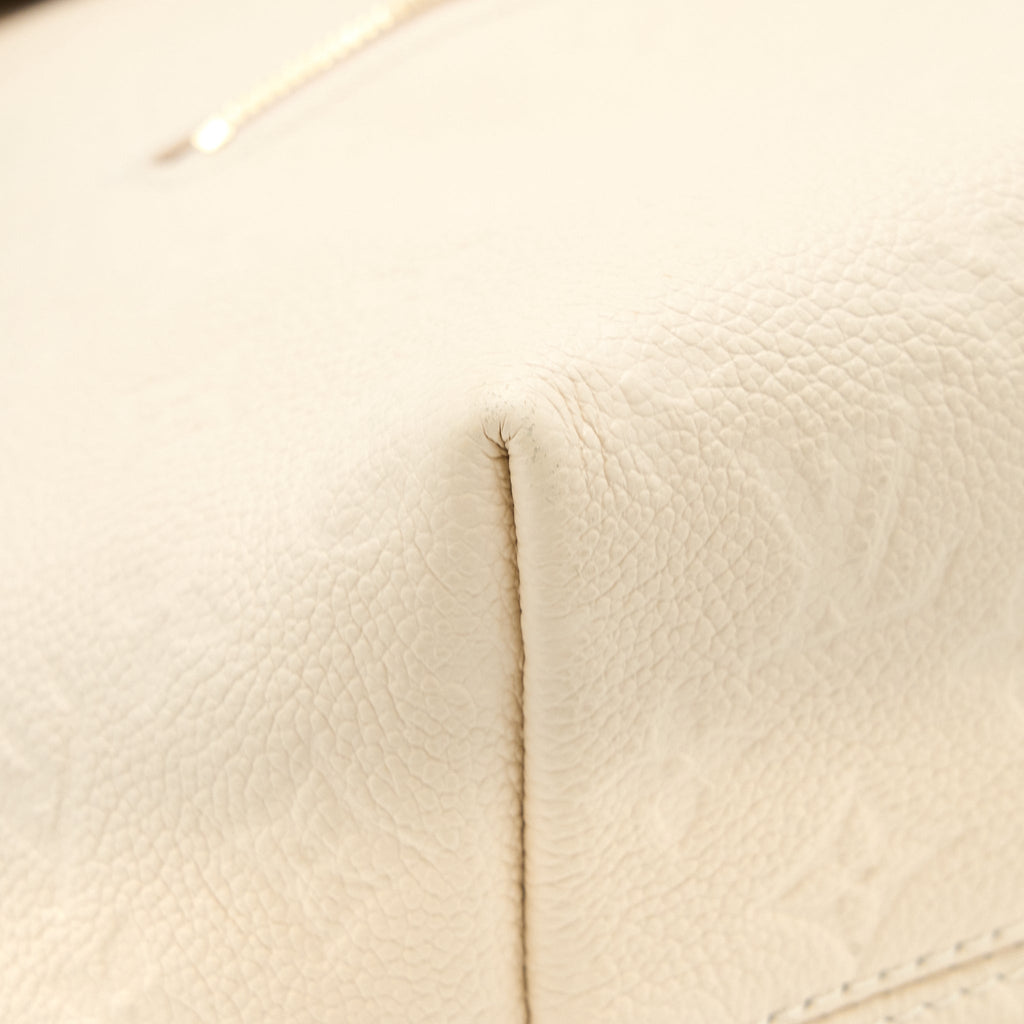 MONTSOURIS BACKPACK MONOGRAM EMPREINTE CREAM GHW