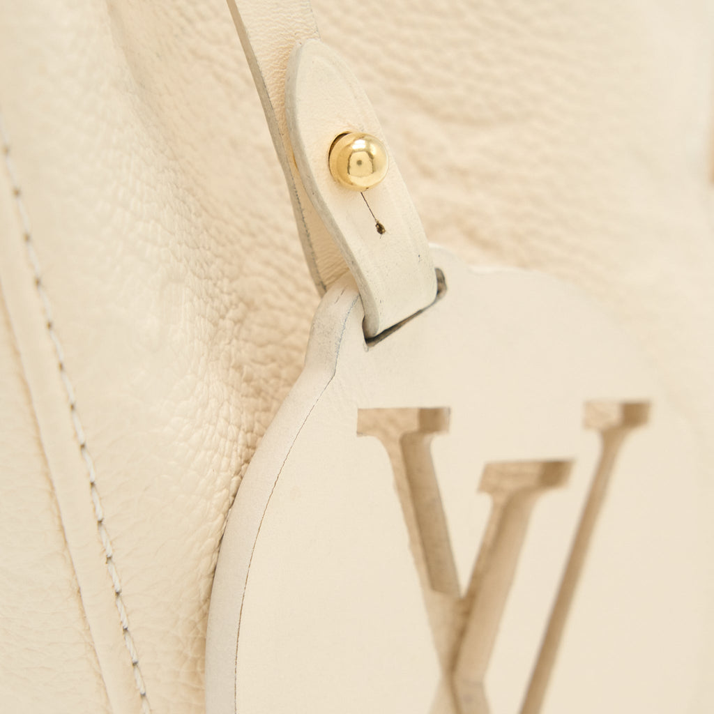 MONTSOURIS BACKPACK MONOGRAM EMPREINTE CREAM GHW