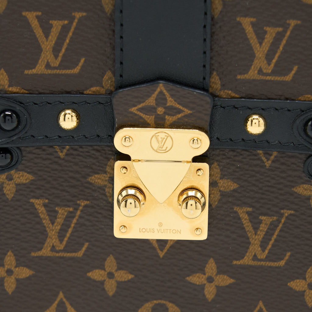 VERTICAL TRUNK POCHETTE MONOGRAM CANVAS GHW