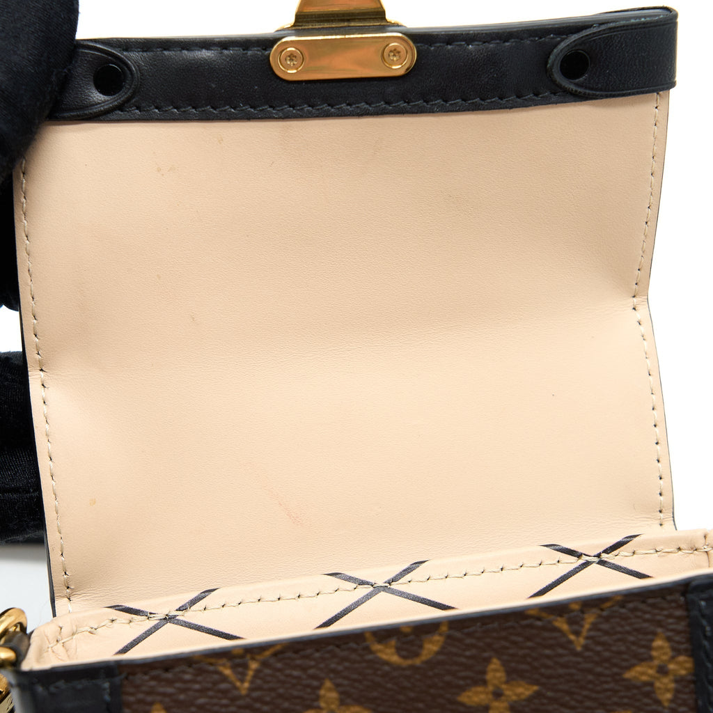 VERTICAL TRUNK POCHETTE MONOGRAM CANVAS GHW