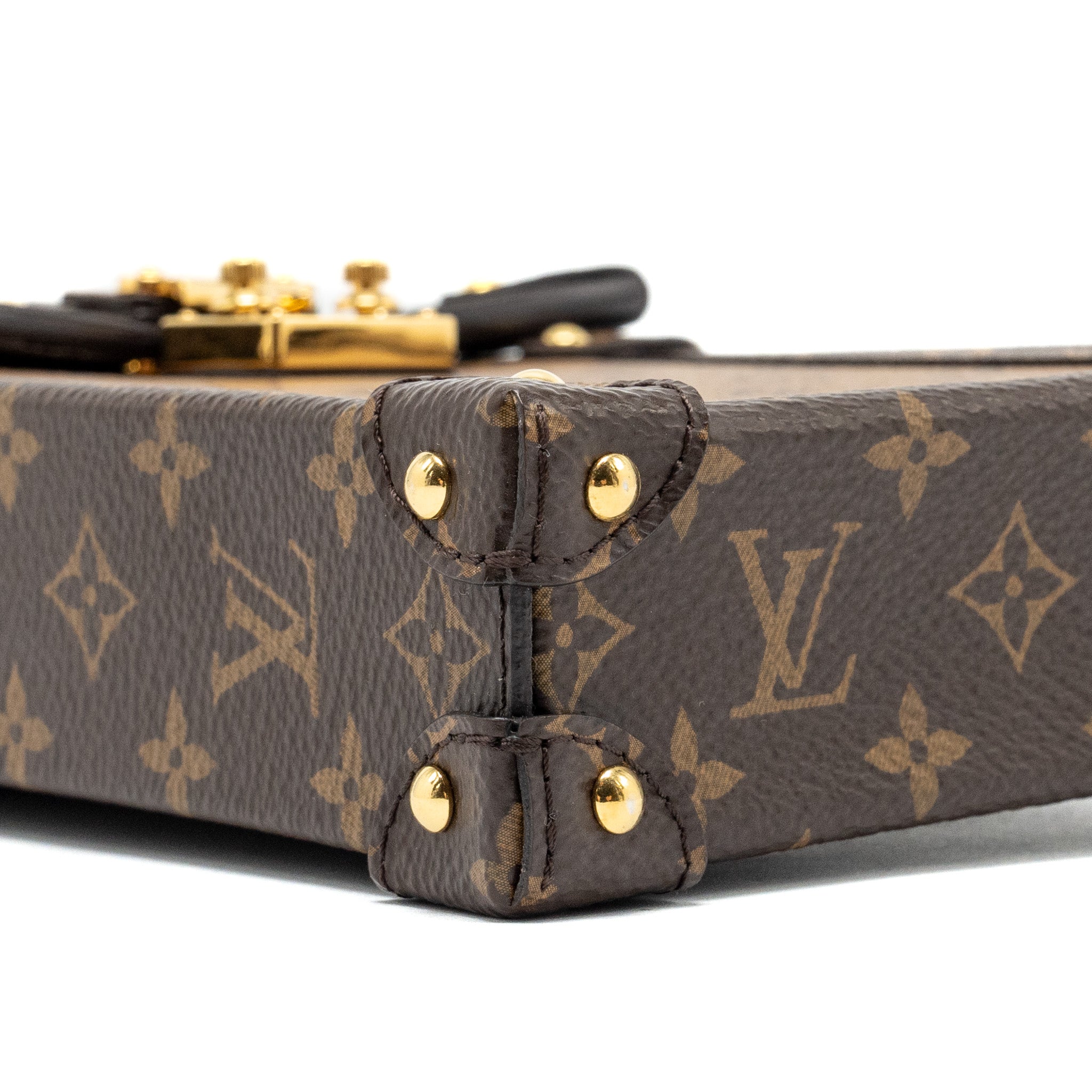 VERTICAL TRUNK POCHETTE WITH CHAIN MONOGRAM REVERSE CANVAS GHW