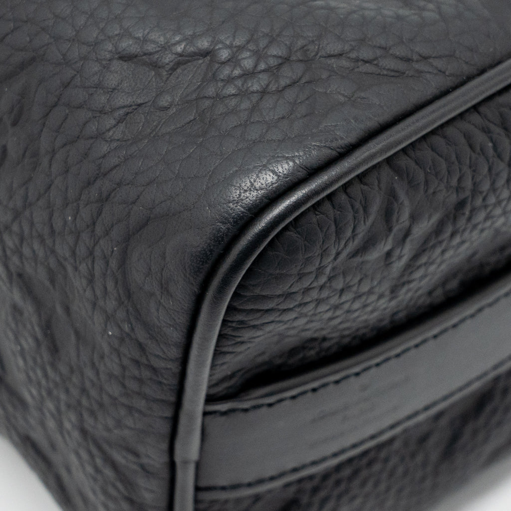 KEEPALL BANDOULIERE 25 MONOGRAM TAURILLON LEATHER BLACK WITH BLACK HARDWARE