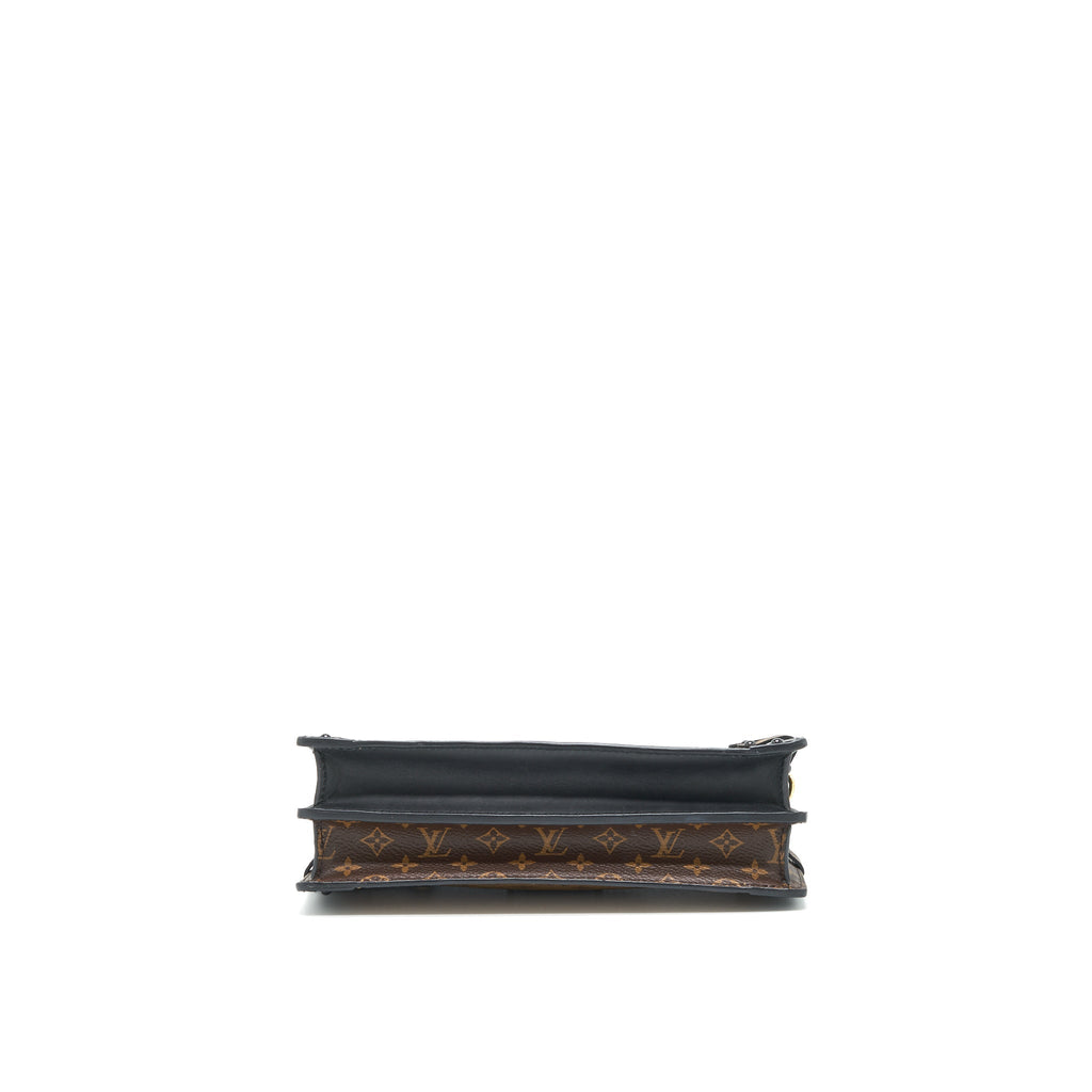 TRUNK CLUTCH BAG MONOGRAM