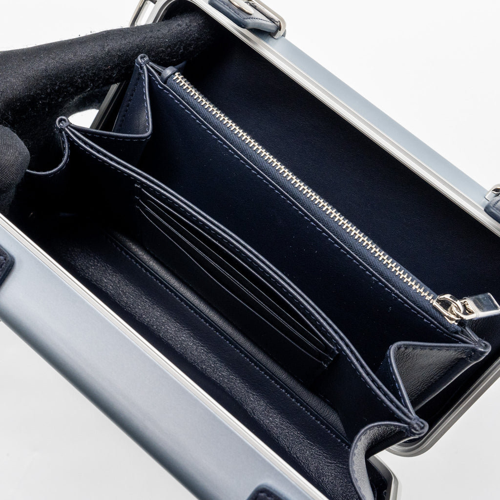 X RIMOWA CLUTCH TRUNK BAG ALUMINIUM / CALFSKIN SILVER / BLACK SHW