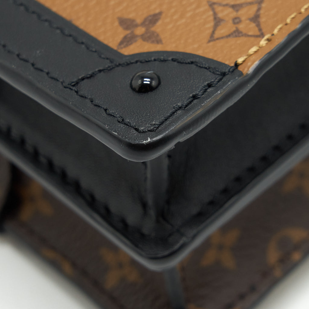 TRUNK CLUTCH BAG MONOGRAM REVERSE CANVAS YEAR 2019