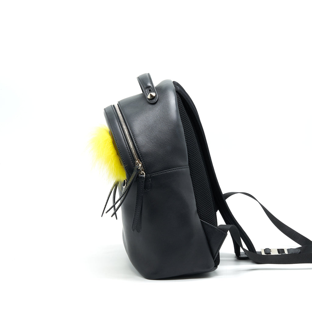 MONSTER BACKPACK IN BLACK WITH YELLOW FUR