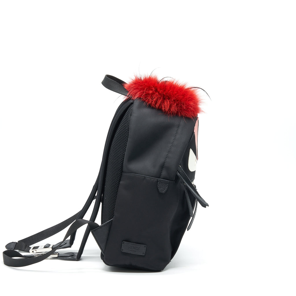 MONSTER BACKPACK IN BLACK WITH RED FUR