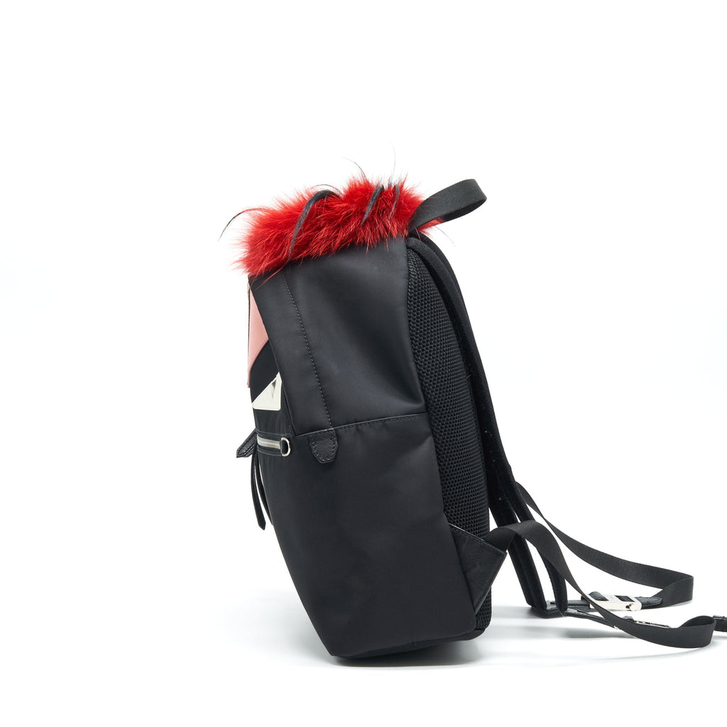 MONSTER BACKPACK IN BLACK WITH RED FUR