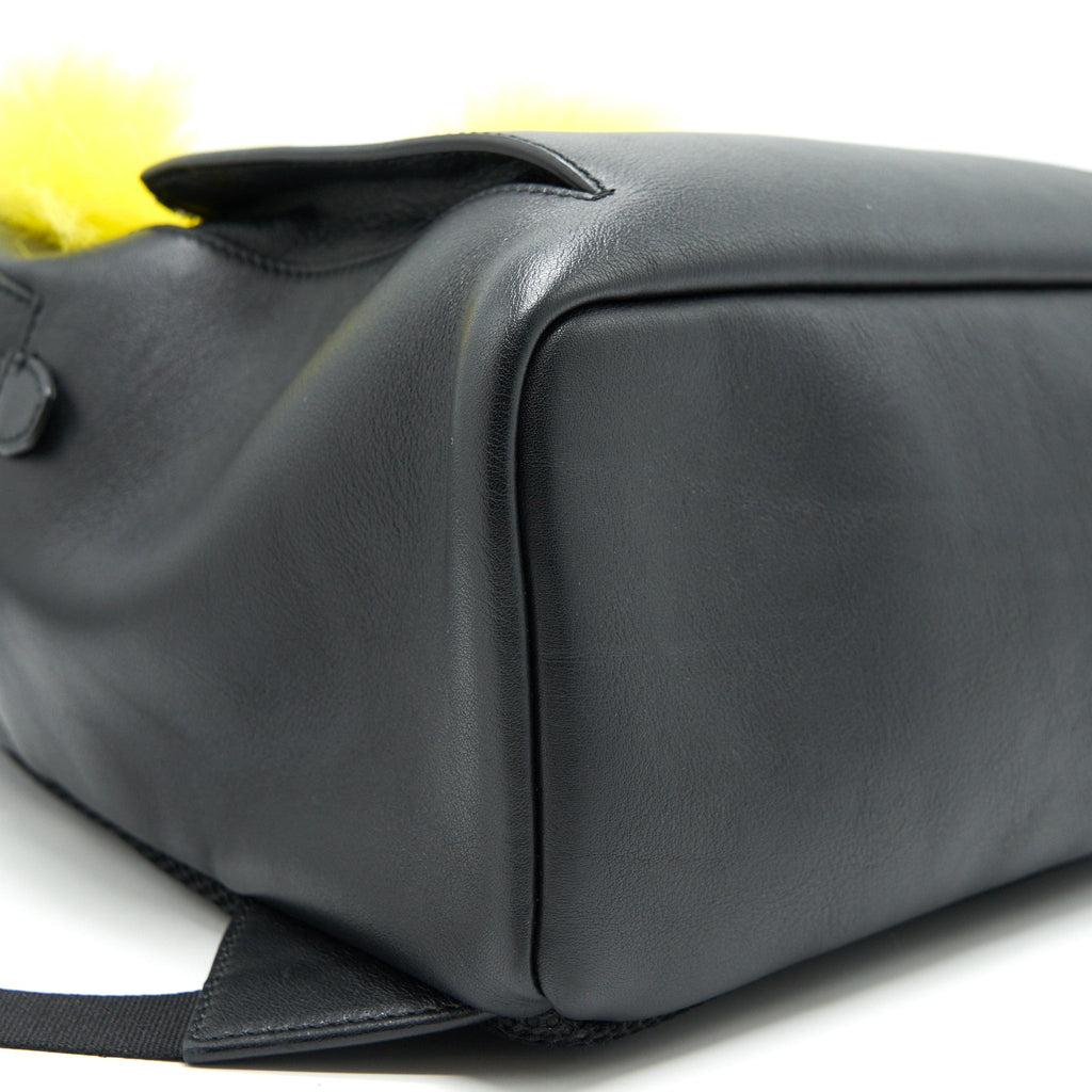 MONSTER BACKPACK IN BLACK WITH YELLOW FUR