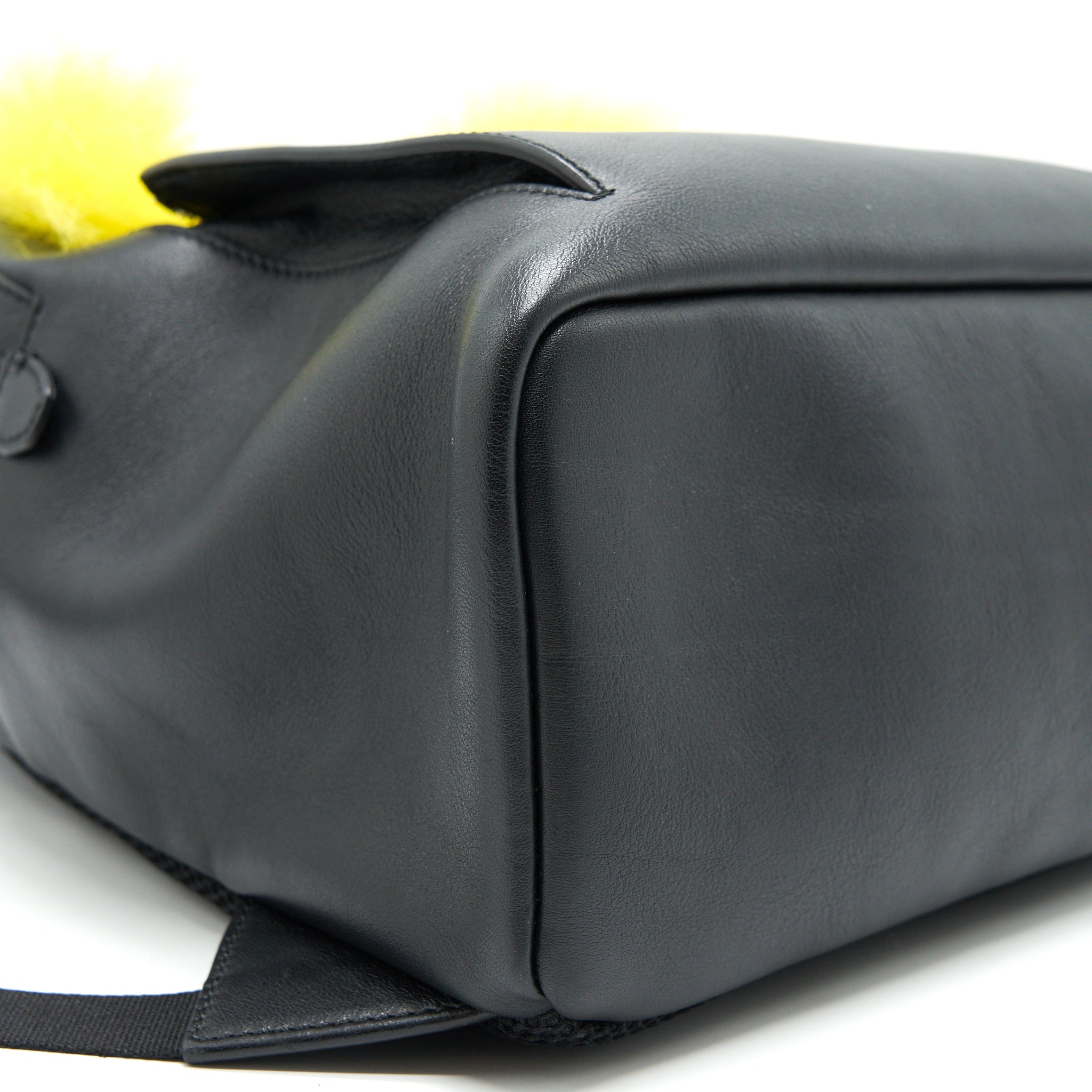 MONSTER BACKPACK IN BLACK WITH YELLOW FUR