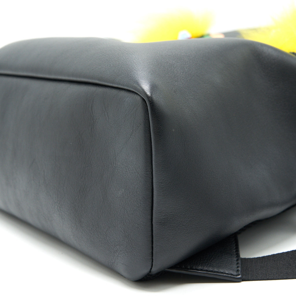 MONSTER BACKPACK IN BLACK WITH YELLOW FUR
