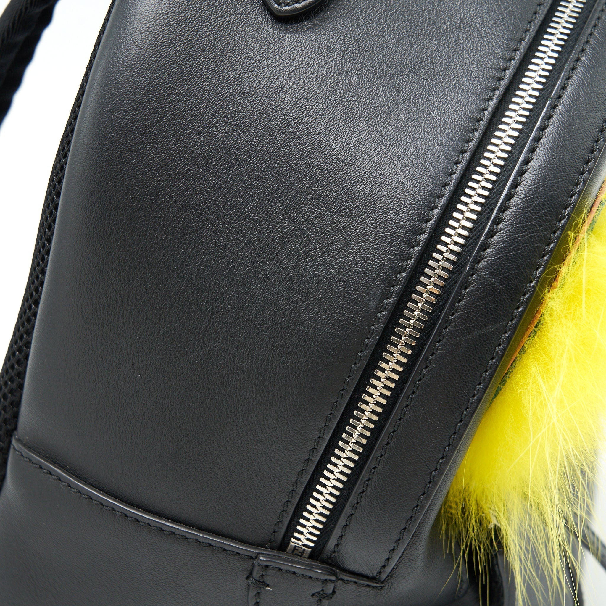 MONSTER BACKPACK IN BLACK WITH YELLOW FUR