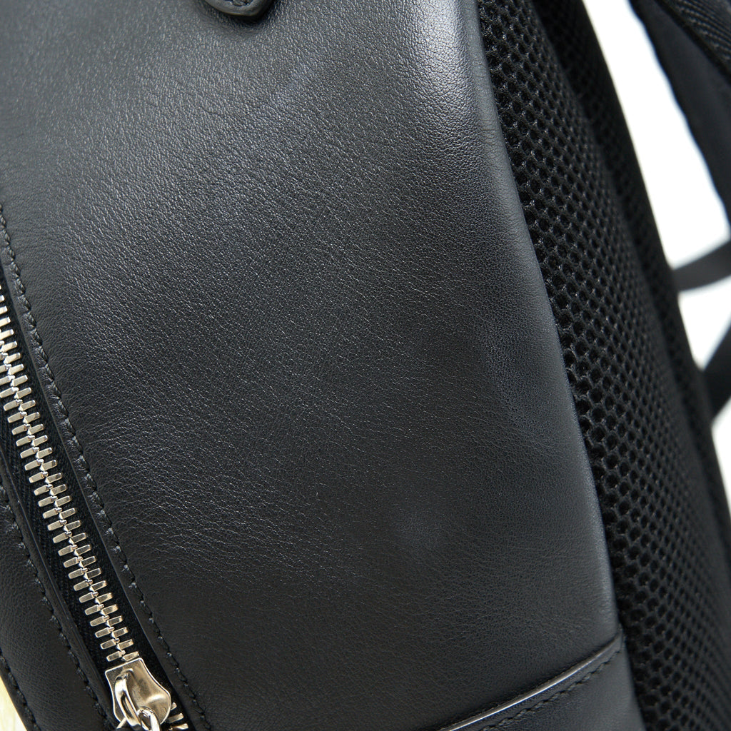 MONSTER BACKPACK IN BLACK WITH YELLOW FUR