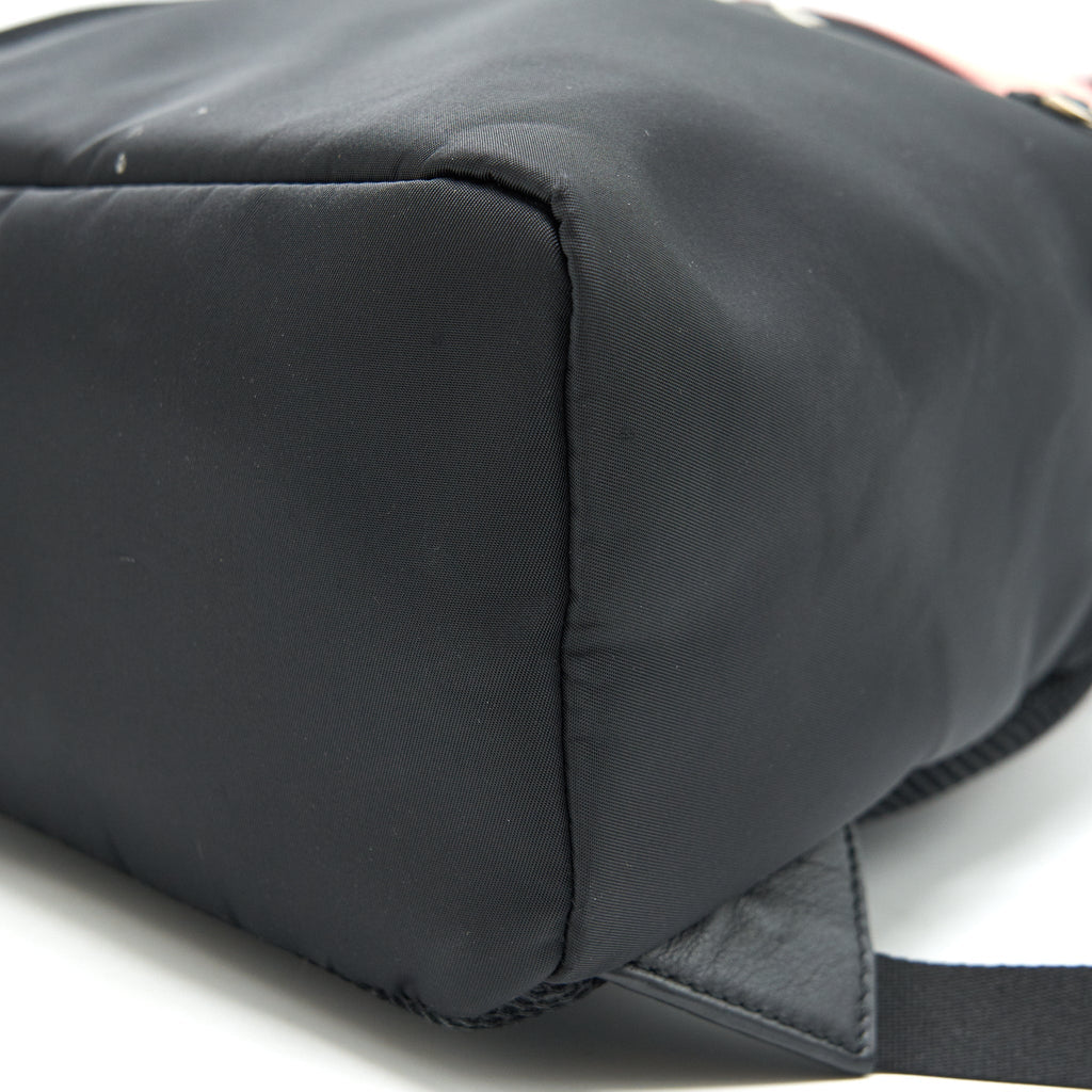 MONSTER BACKPACK IN BLACK WITH RED FUR