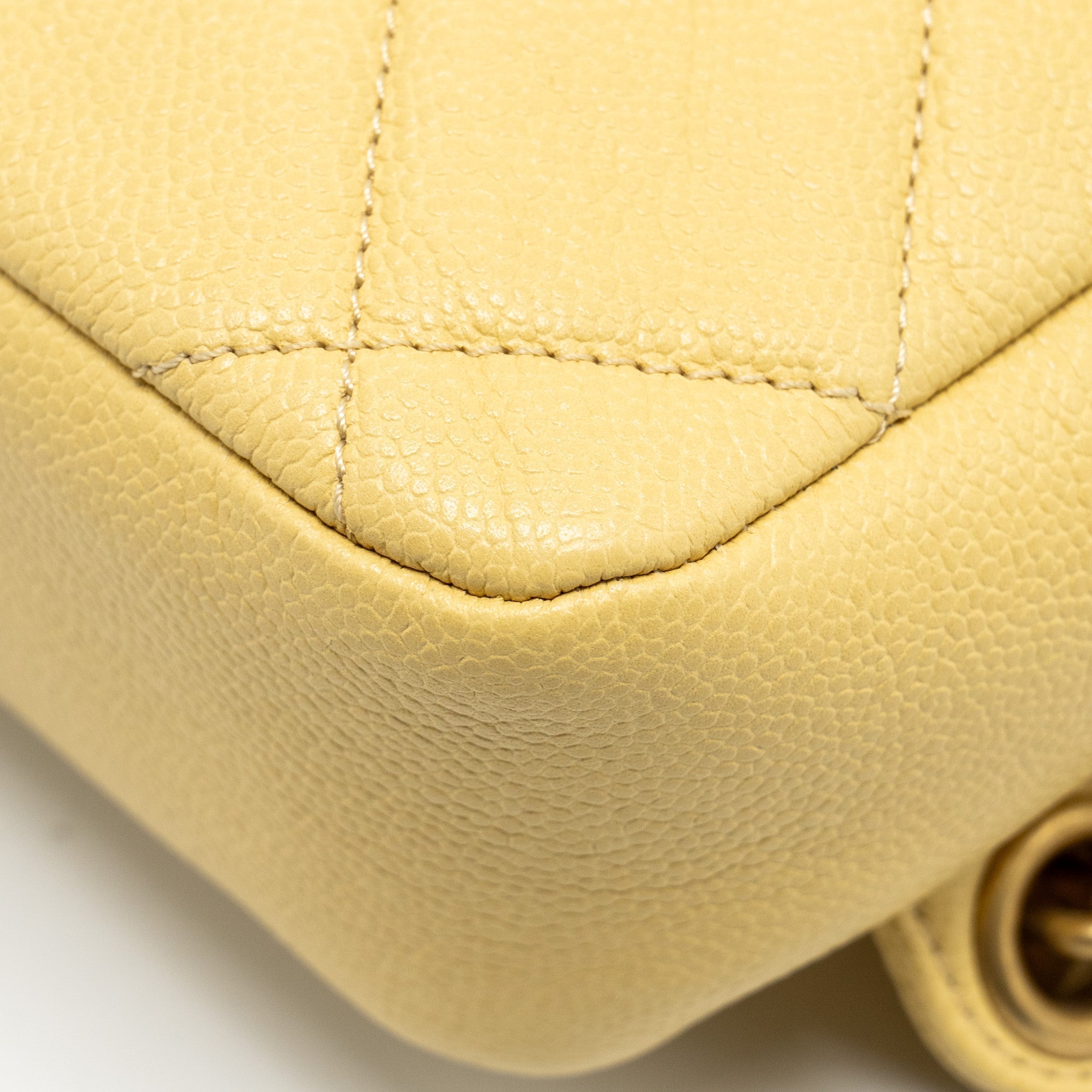 22P QUILTED FLAP BACKPACK CAVIAR LIGHT YELLOW GHW (MICROCHIP)