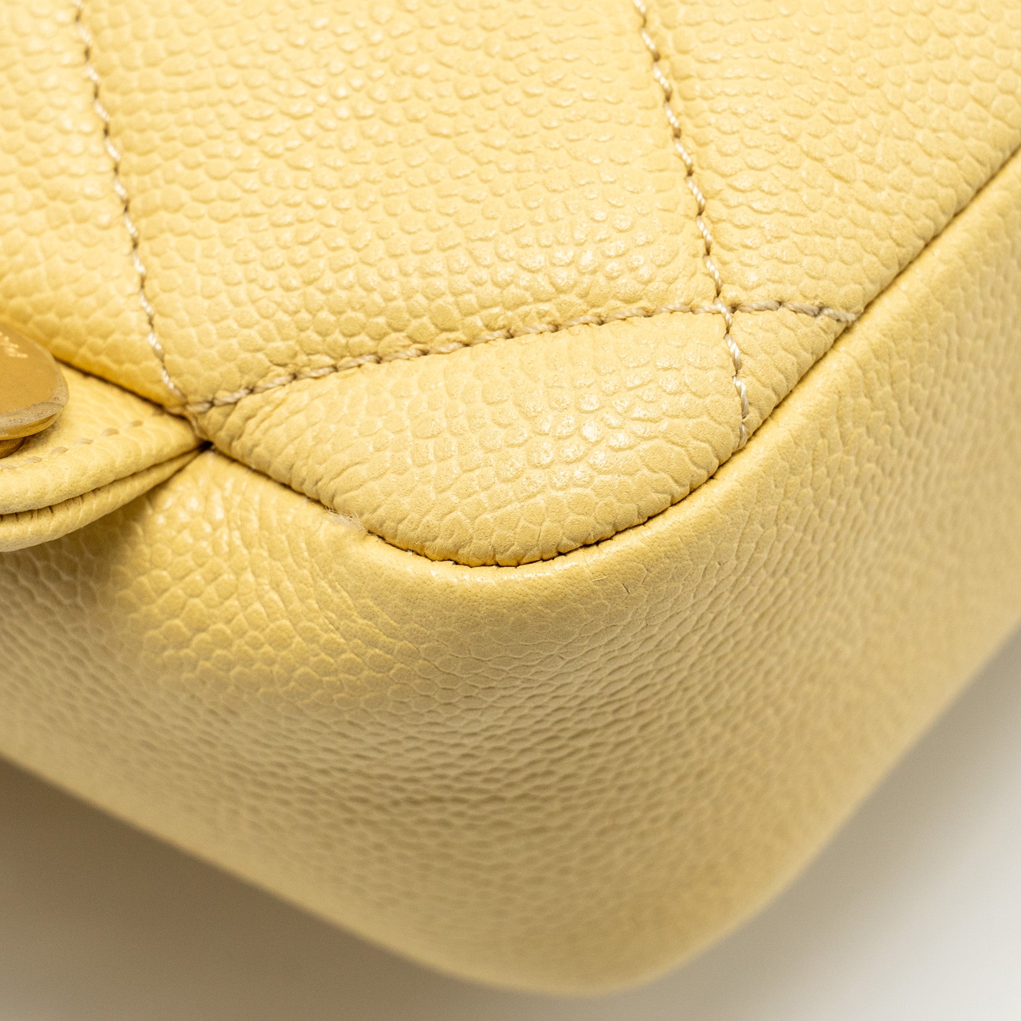 22P QUILTED FLAP BACKPACK CAVIAR LIGHT YELLOW GHW (MICROCHIP)
