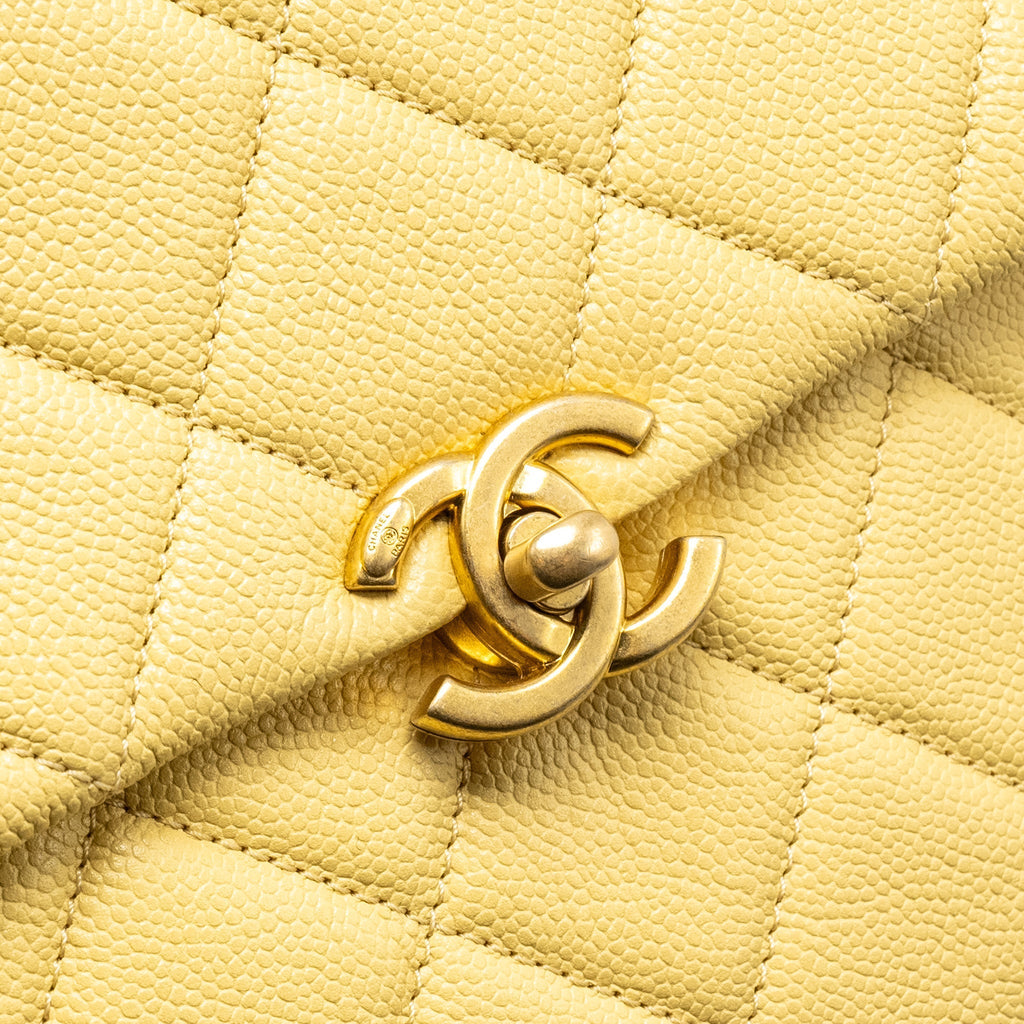 22P QUILTED FLAP BACKPACK CAVIAR LIGHT YELLOW GHW (MICROCHIP)
