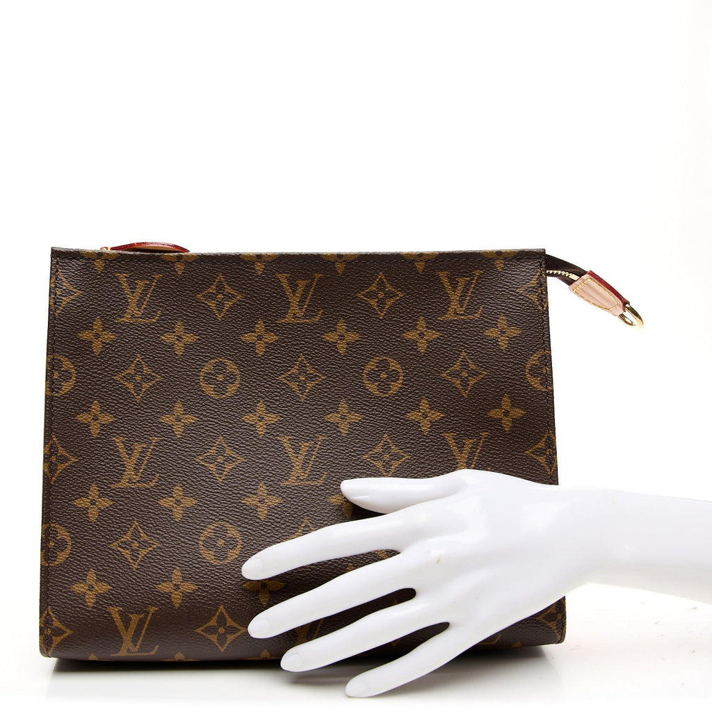 MONOGRAM TOILETRY POUCH ON CHAIN